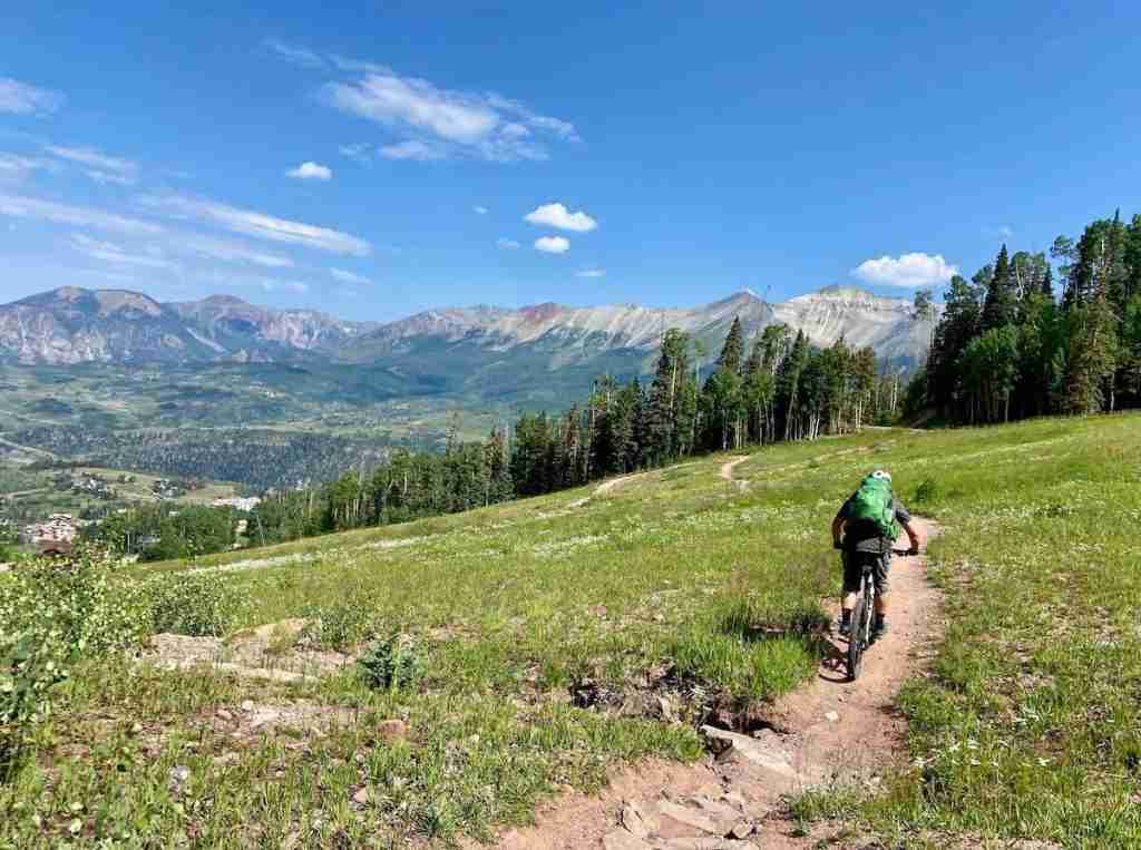 Learn everything you need to know about the San Juan Hut System Telluride To Moab mountain bike ride in this complete planning guide. 