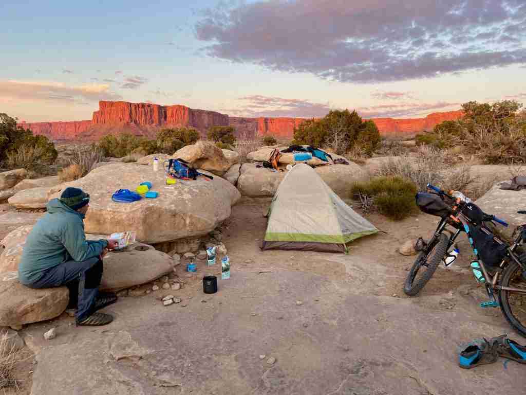 Learn the best tips for planning your White Rim Trail bikepacking adventure including what to pack, how to carry water, and where to camp.